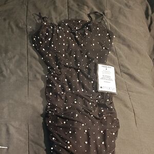 Elegant Black Dress with White Polka Dots